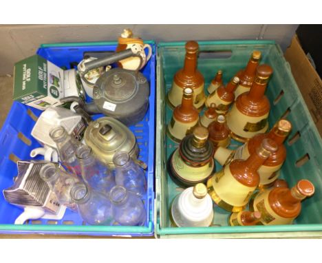 A collection of Bells whisky decanters, novelty teapots, Kelloggs Cornflakes and The Daily Mirror advertising milk bottles, a