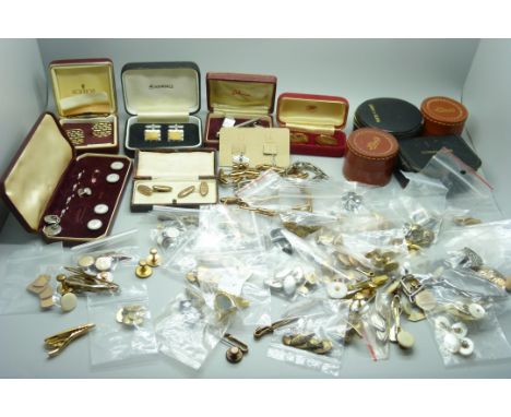 A collection of tie-pins, cufflinks, shirt sleeve bands, etc. 