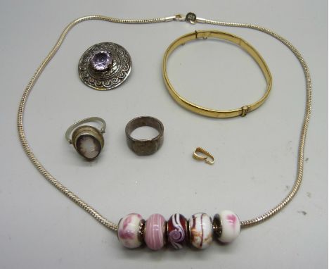 A collection of silver jewellery and a rolled gold bangle 