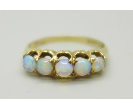 An 18ct gold and five stone opal ring, 2.5g, O 