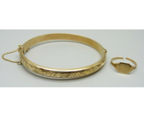 A 9ct gold bangle, 10.1g, and a 9ct gold ring, 1.1g, ring a/f 