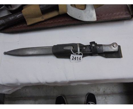 A German K98 bayonet in scabbard.9010 on scabbard on top front.E.U.F. Horstor 1939 on other side.No visible marks to spine.Bl