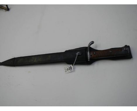 A W.K.C (Czech) Solingen bayonet.The scabbard is corroded and it is difficult to find numbers