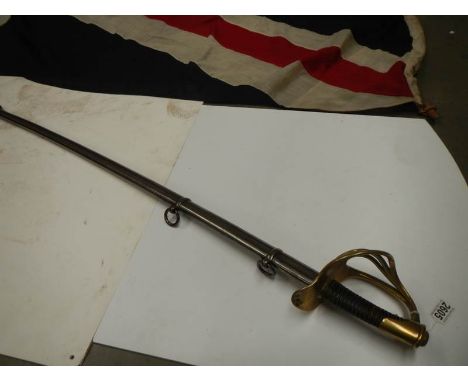 An early Sabre with brass hilt and steel scabbard. COLLECT ONLY.Pommel is tight.No wire on grip. Grip is worn in places.No vi