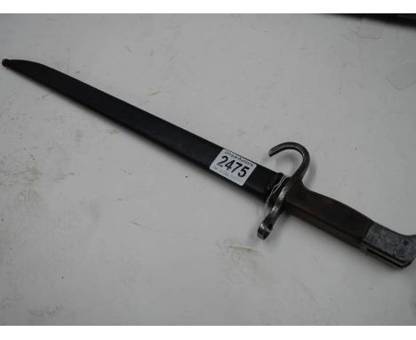 A pre WW1 bayonet with hooked quillion and with scabbard, blade 39.5 cm.