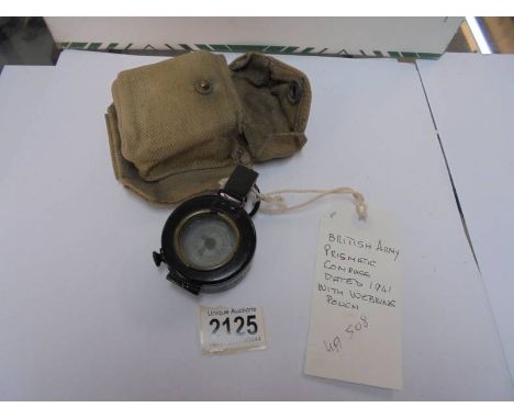 A British army prismatic compass dated 1941 with webbing pouch.