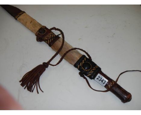 A tribal hunting knife and a small dagger.