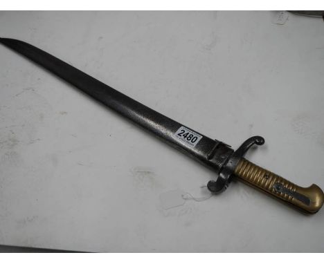 A French Chassepot bayonet with scabbard No.548, inscribed on edge and dated 1814-1942.