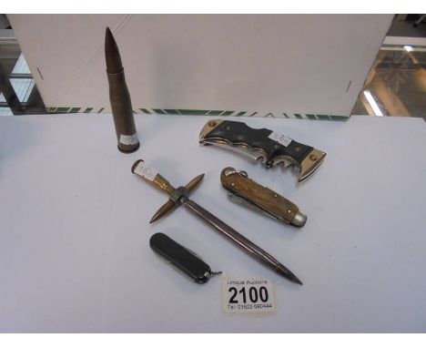 An item of trench art, three vintage pen knives etc.,