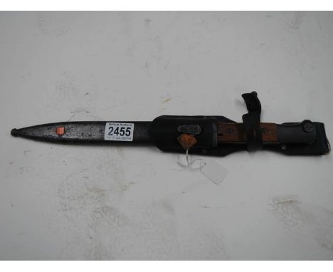 A K98 bayonet stamped COF44, serial No. 6959 with scabbard and frog.