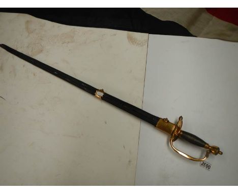 An early sword with brass hilt and in scabbard. COLLECT ONLY.Stitching on scabbard has perished.Sword protrudes out of end of