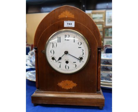 An inlaid mantle clock Condition Report: Available upon request