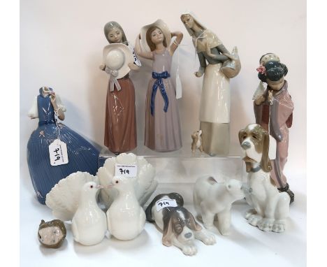 Assorted Lladro and Nao figures including girls, dogs, doves etc Condition Report: girl with blue dress has had her head off.