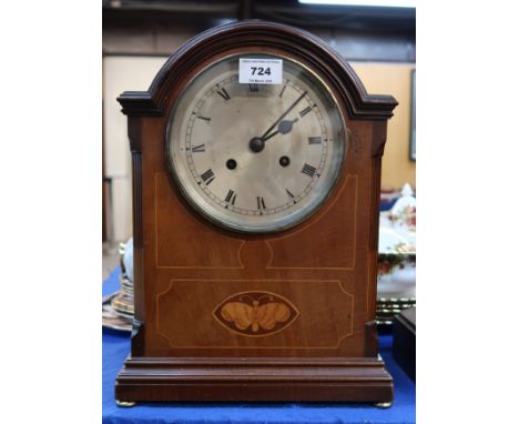 An Edwardian mantle clock inlaid with a butterfly, the Peerless movement numbered 103782 Condition Report: Available upon req