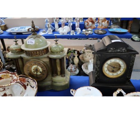 A green onyx mantle clock and a black slate mantle clock Condition Report: No damage to cases, clocks not working. 