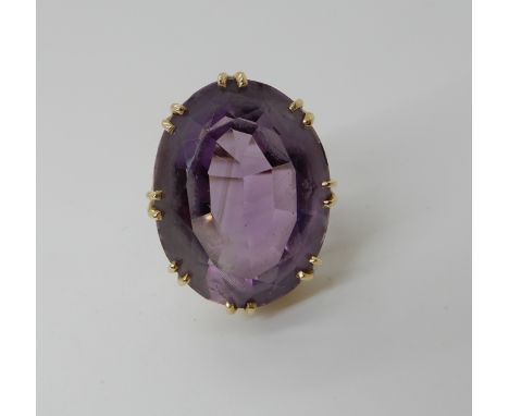 A 9ct gold large amethyst ring approx 25mm x 19mm x 12mm, finger size M, weight 11.5gms Condition Report: Available upon requ