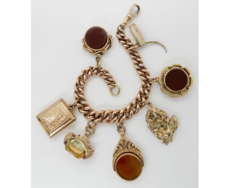 A 9ct gold curb link bracelet, with three vintage 9ct fob seals, 9ct locket, 'melt' gold nugget and other items, combined wei