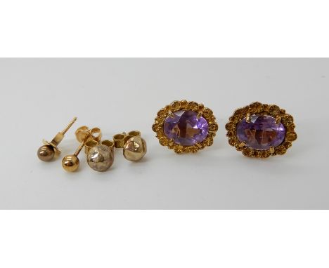 A pair of 9ct gold amethyst set earrings and two further pairs of 9ct earrings, total weight approx 4.9gms Condition Report: 