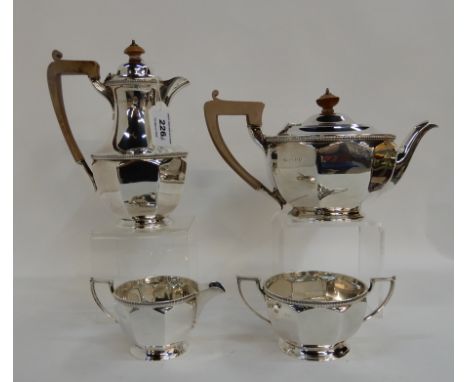 A four piece silver tea service, London 1938, with faceted body and gadrooned border, 1402gms Condition Report: Available upo