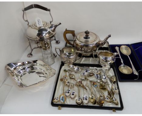 A lot comprising an EP spirit kettle, tea service, collector's spoons etc Condition Report: Available upon request