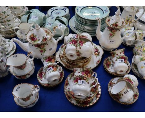 Royal Albert Old Country Roses tea and coffee wares including a tea pot, six teacups, saucers, plates, coffee pots, and six c