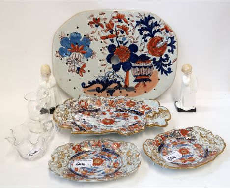 A Mason's Ironstone meat drainer, a patent Ironstone china dish and two smaller dishes, two glass custard cups and a pair of 