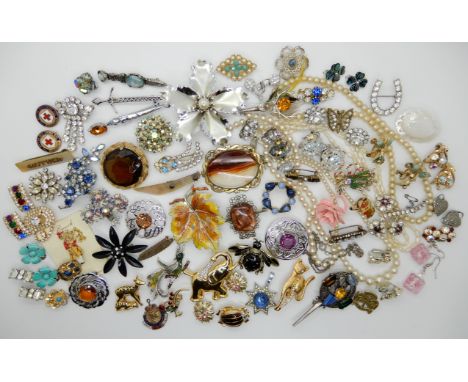 A collection of vintage costume jewellery to include animal brooches Condition Report: Not available for this lot