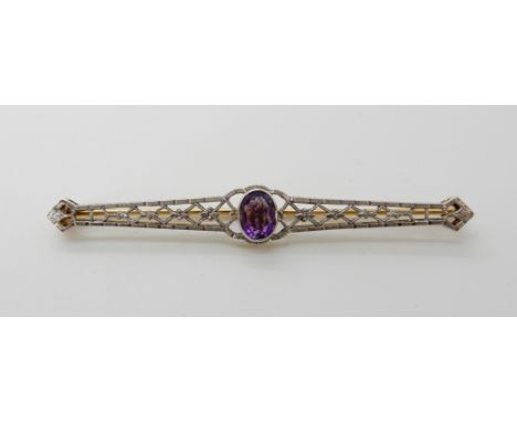 A 14k yellow and white gold amethyst brooch, length 6.3cm, weight 3.6gms Condition Report: Available upon request
