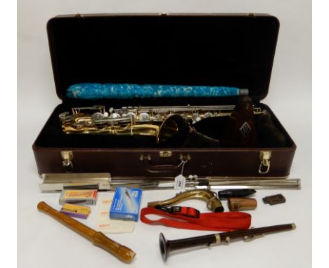 A Eurhart tenor saxophone with various accessories and a Wittner metronome Condition Report: Available upon request