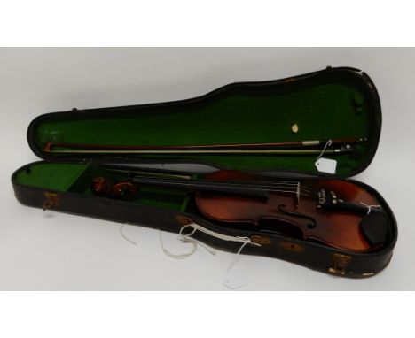 A two piece back violin 35.5cm with label to the interior Antonius Stradivarius Cremonensis Faciebad anno 17. with a bow 73cm