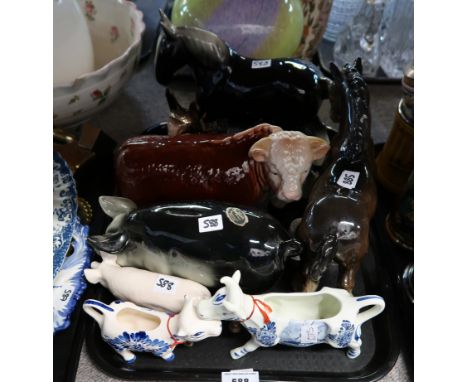 Assorted ceramic farm animals, cow creamers etc Condition Report: Available upon request
