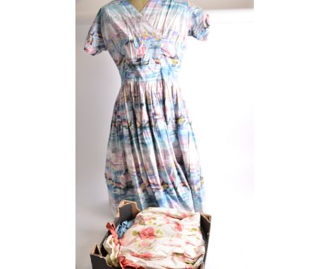 Three 1950's era vintage dresses, a rose print dress by Horrockses,  a boat print dress with a label for Sambo Fashions and a