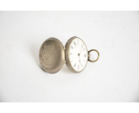 A late 19th Century or early 20th Century Continental white metal open faced pocket watch, with white enamel dial and Roman n