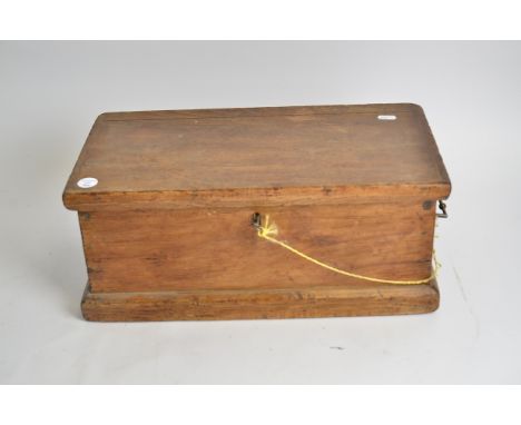 A small pine trunk with brass handles,  and lock, 48.5cm x 20cm x 25.5cm