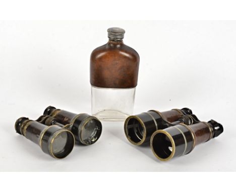 Two pairs of Victorian field glasses,  together with a hip flask with a twist top lid and partially covered in brown leather 