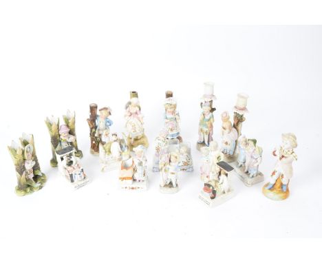 A quantity of Victorian and later fairings spill and candlestick holders,  mostly Conta Boehme, to include "which is pretties