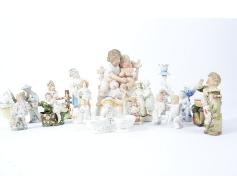A group of more than fifteen predominantly glazed Victorian and later figures,  one a figure of Bubbles, after the Millais oi