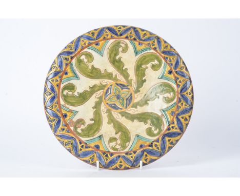 Giovanni Carlo Manzoni of the Minerva Art Ware Manufacturers,  a large shallow dish with circular central geometric motif fla