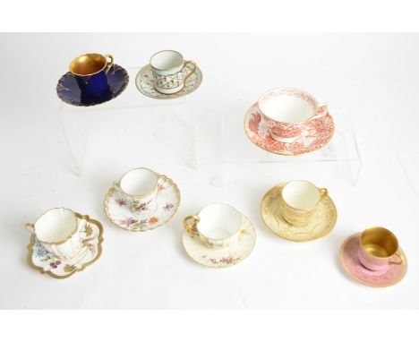 A group of 19th Century and later cabinet cups and saucers,  to include four Royal Worcester examples, one in the blush ivory