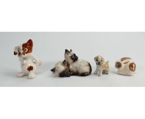 A collection ceramic animals to include: Cats Dogs and Rabbits(4)