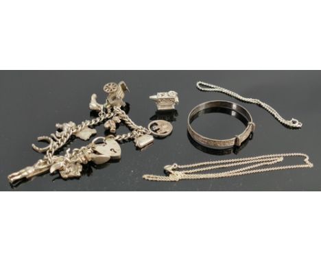 A collection of Silver jewellery: including charm bracelet, bangle, chains etc, 55g.