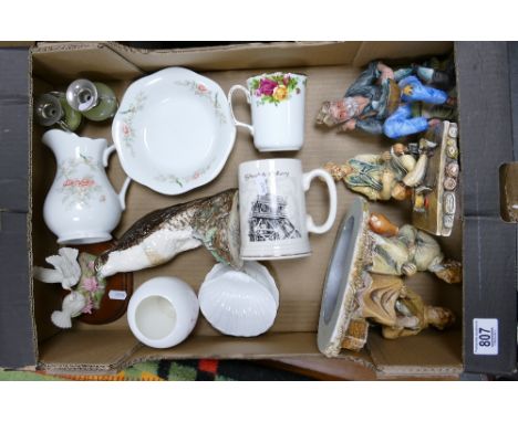 A mixed collection of items to include: plaster tramp figures, Royal Doulton Osprey decanter, decorative items etc 