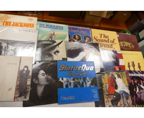 A collection of 1960's &amp; later LP's &amp; Singles including: Beach Boys, The Beatles, Bread, Madness etc  