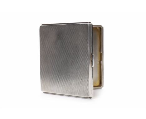 SILVER ENGINE TURNED CIGARETTE CASEmaker William Neale & Son, Birmingham 1934, of Art Deco design; also an engine turned ciga