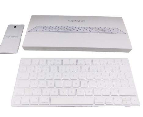 An Apple Magic keyboard, model A1644, boxed.