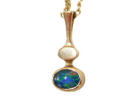 A 9ct gold opal pendant and chain, the oval opal doublet in staggered drop, 2cm high, on fine link neck chain, 40cm long, 2.5