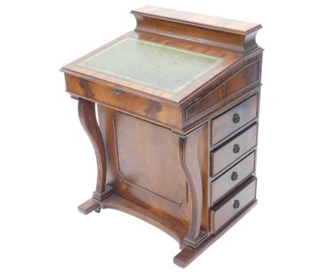 A reproduction mahogany Davenport, the top with a hinged pen compartment and a hinged lid, with green leather insert enclosin