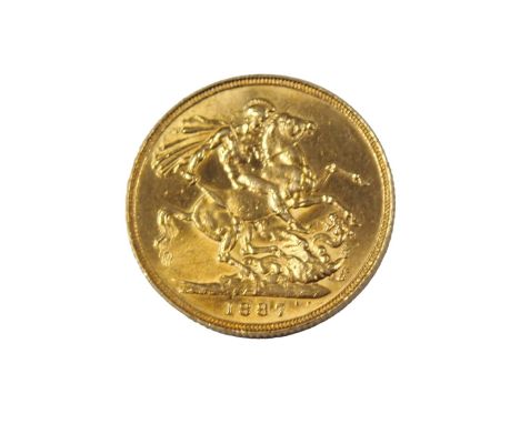 A Victorian full gold sovereign dated 1887. 