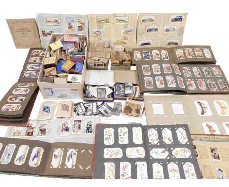 A quantity of cigarette trade and tea cards, to include albums such as Motor Cars, Sofa First, Sea Fishes, Players, Wills, an