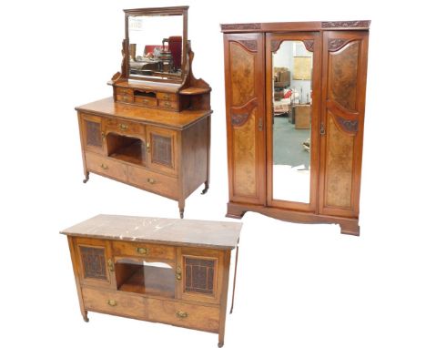A late Victorian associated walnut and burr elm bedroom suite, comprising walnut wardrobe with central mirrored panel, flanke